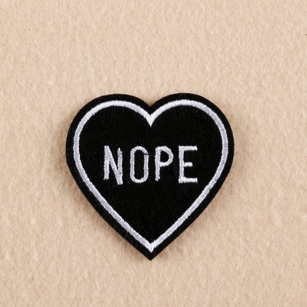 a picture showing a black heart patch to dropship